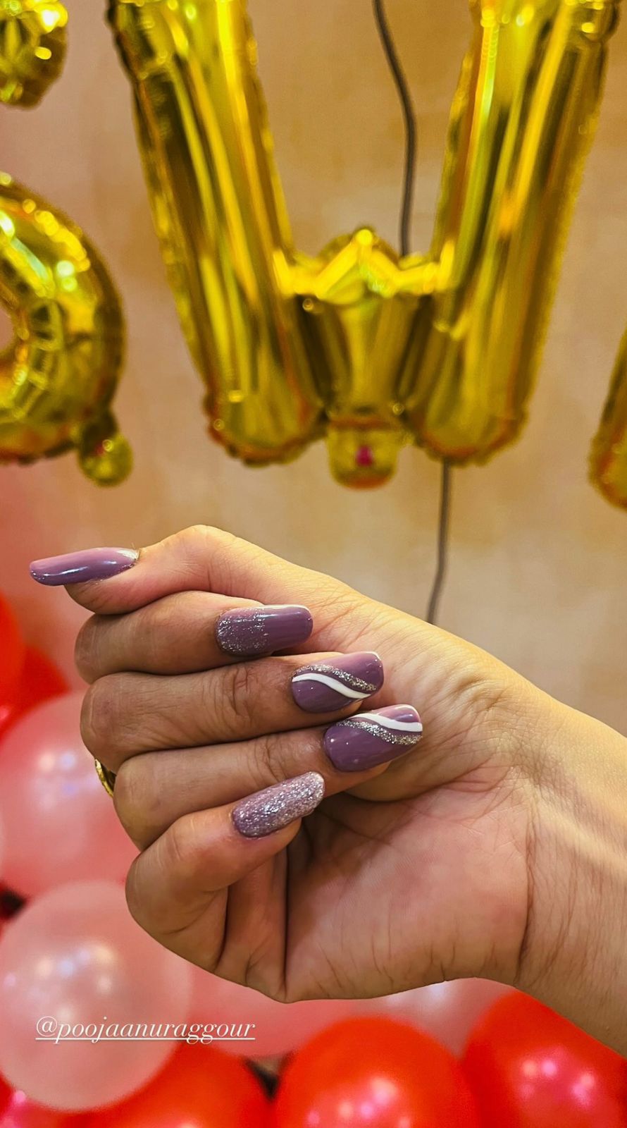 Stylish purple nail art design created by Glamvibe, Indore.