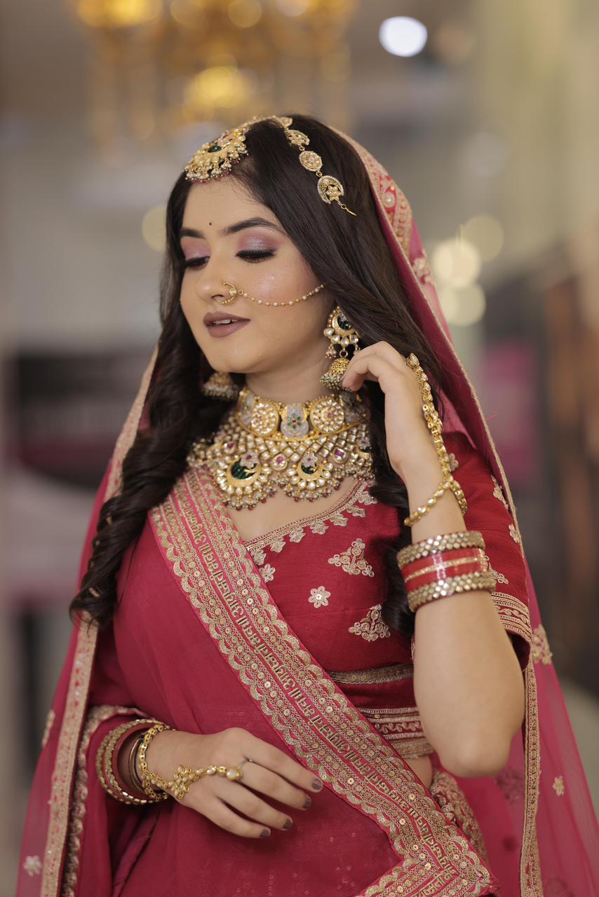 Ms. Hitanshi Popat looking stunning in a traditional Red Lehenga Bridal Look.