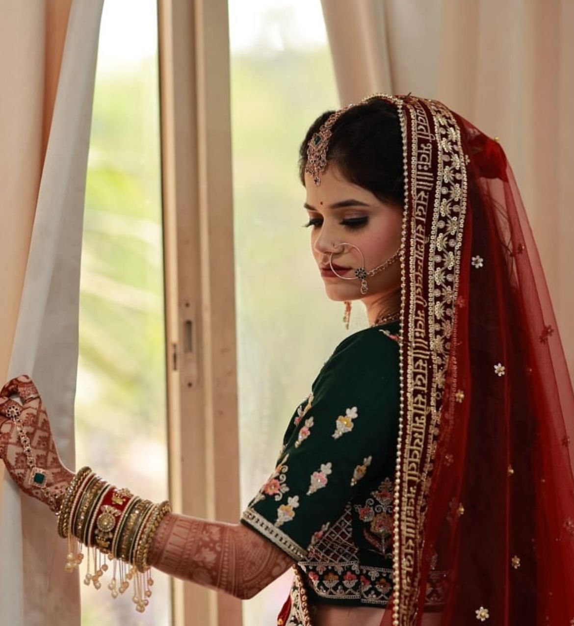 Ms. Sakshi glowing in her bridal photoshoot look.